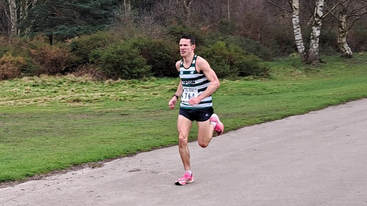 Jonny Carter running outdoors as an England Masters distance runner