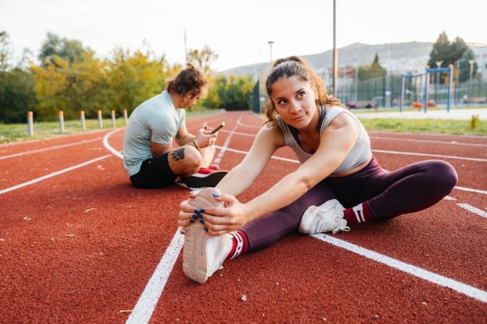 Endurance runner recovering after training.